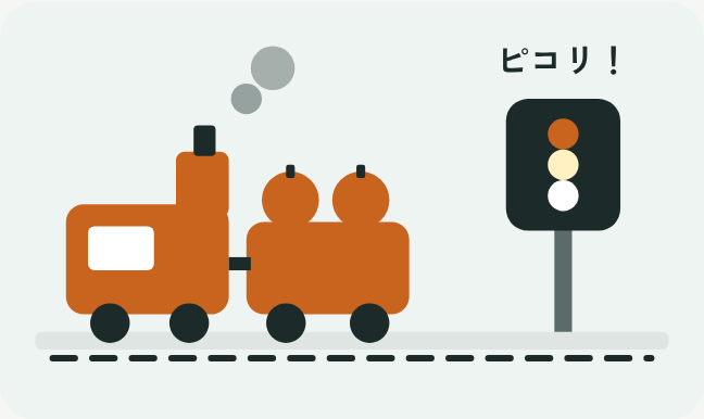 トマトを積んだ赤い列車と信号機が並ぶイラスト