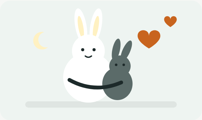 うさぎの親子がぎゅっと抱き合い、上にハートが浮かんでいるイラスト