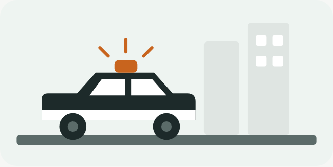 サイレンを光らせて街を走るパトカーのイラスト