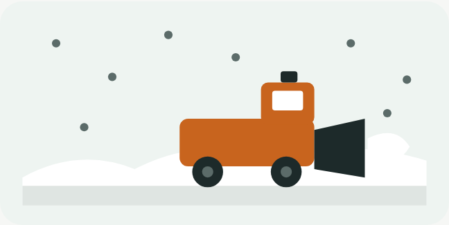 雪が降るなか、除雪車が道の雪をかき分けて進むイラスト